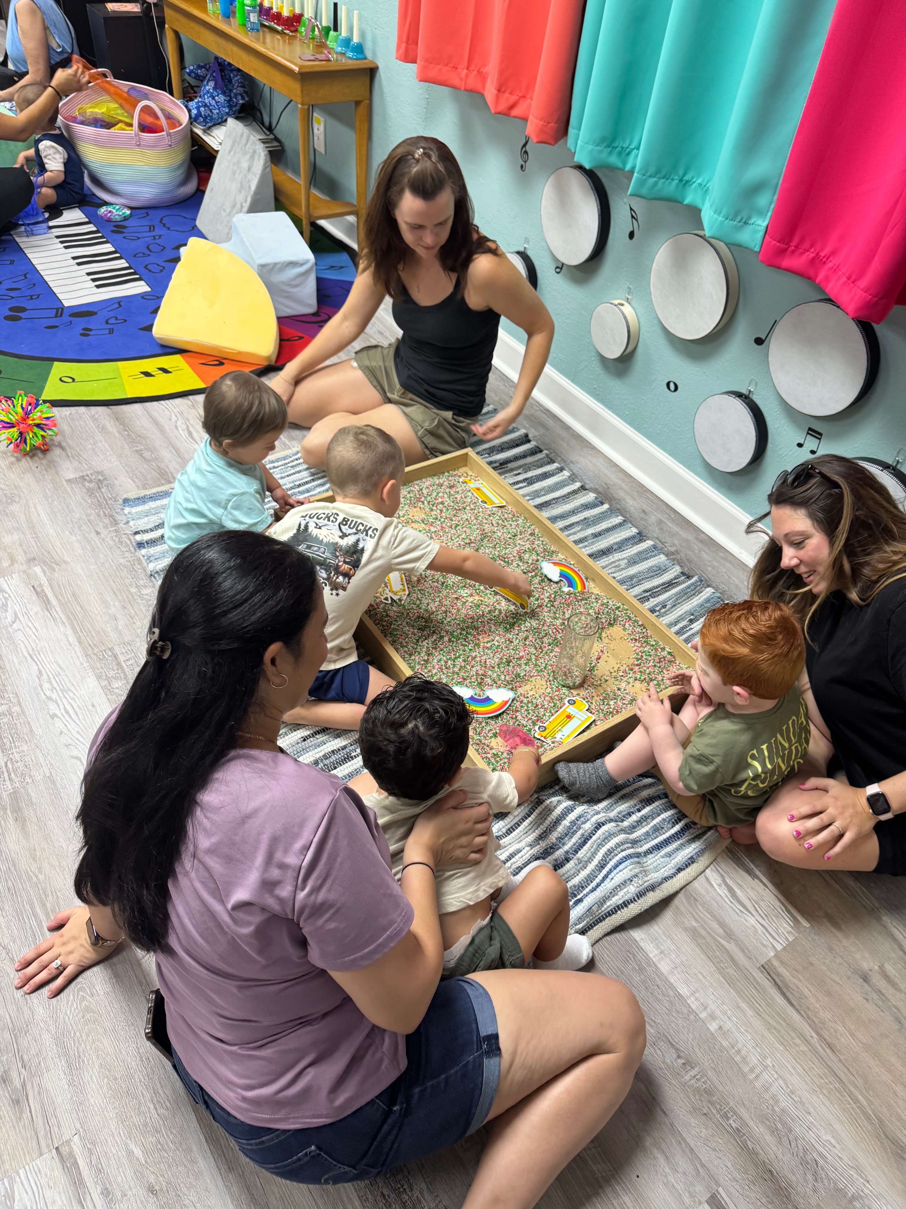Children exploring sensory materials