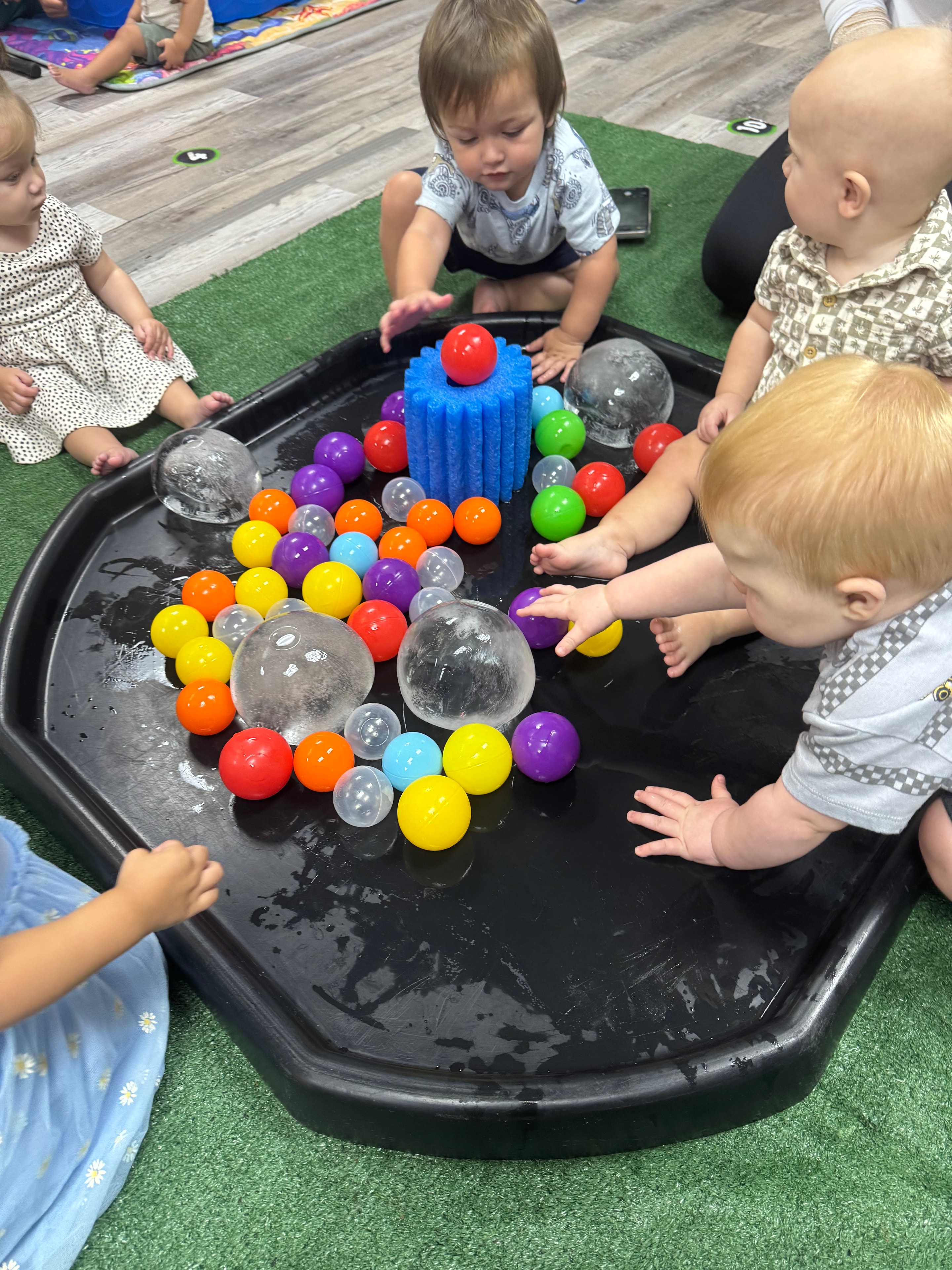 Child exploring a sensory activity at Sincerely Sensory